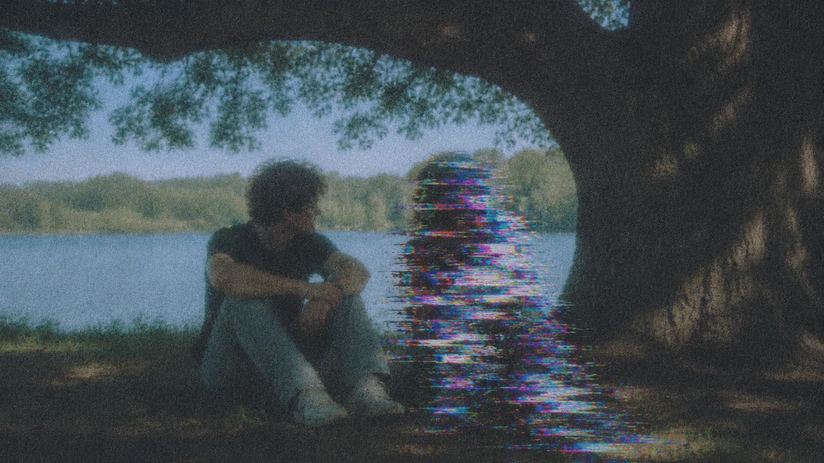 A person sitting beside Mia, represented as a glitched digital figure